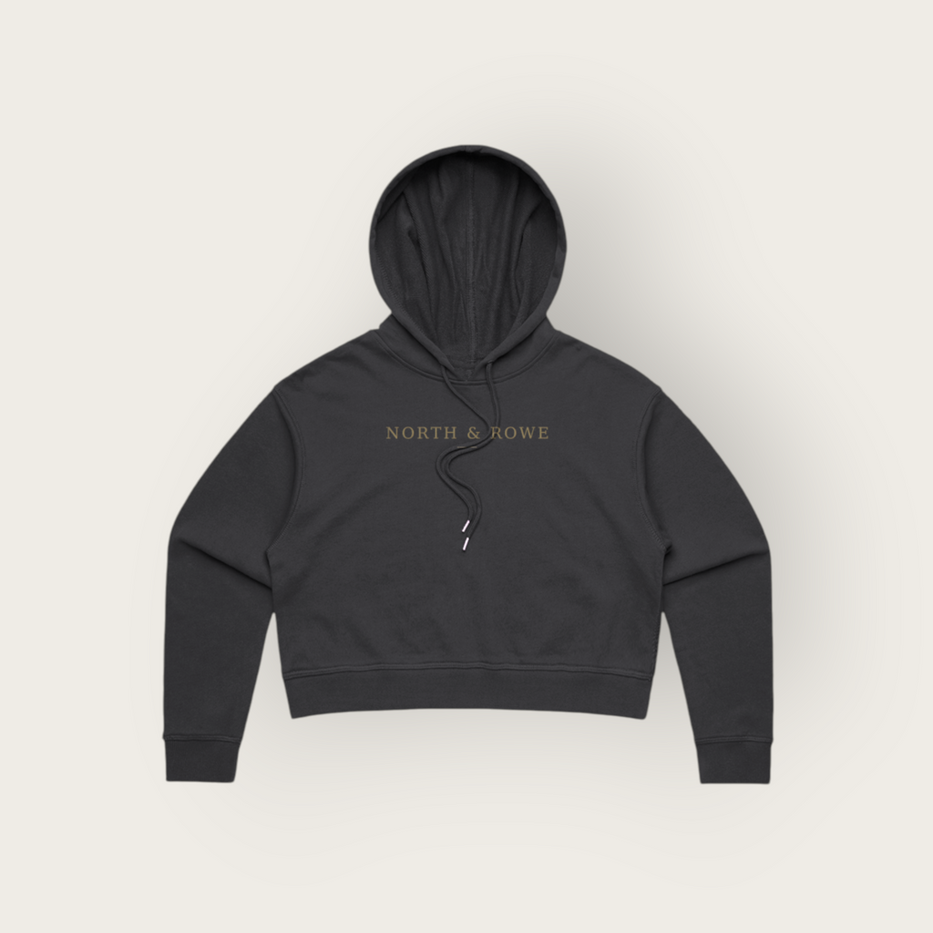 North & Rowe black cropped pullover hoodie with adjustable drawstrings and minimalist chest branding