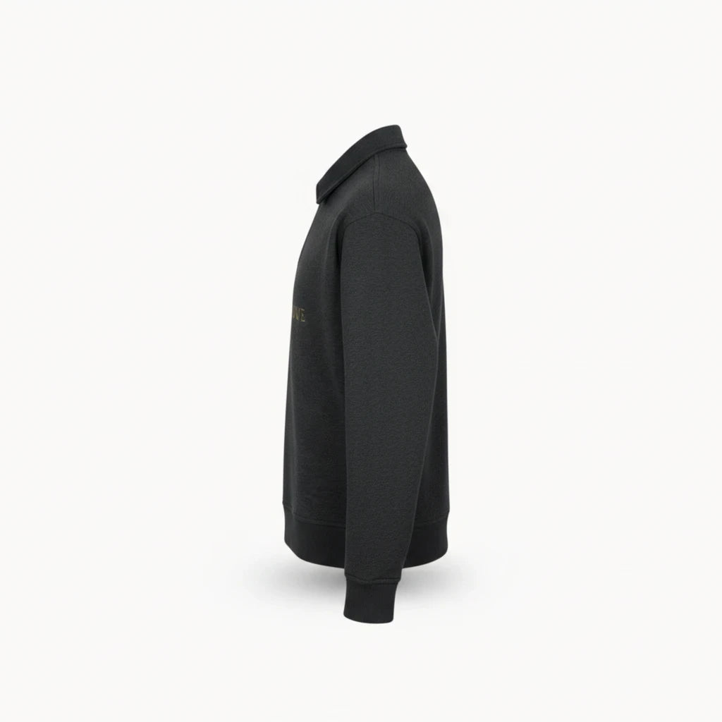 North & Rowe charcoal heather unisex boxy quarter-zip sweatshirt with ribbed cuffs and collar, side profile view.