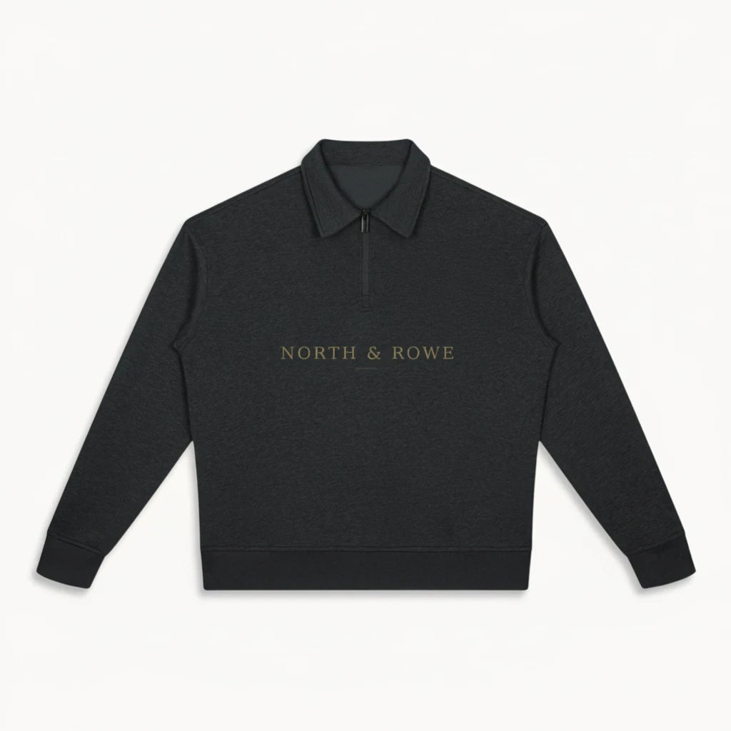 North & Rowe charcoal heather unisex boxy quarter-zip sweatshirt with a collared neckline and chest logo branding.