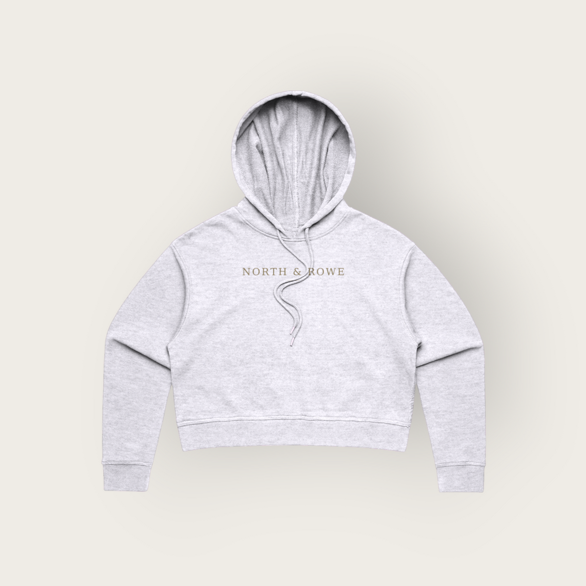 North & Rowe women's grey cropped pullover hoodie with a drawstring hood and minimalist chest branding.
