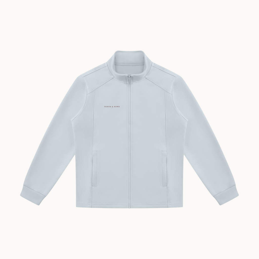 North & Rowe unisex light grey performance track jacket with a stand collar, full-zip front, and side pockets.