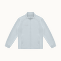North & Rowe unisex light grey performance track jacket with a stand collar, full-zip front, and side pockets.